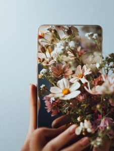 An unplugged device blooming with flowers, symbolizing personal growth and rejuvenation when disconnected from technology