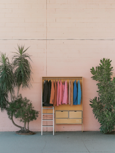 A clothing rack that turns into a ladder, representing the elevation and transformation that comes with finding the right outfit