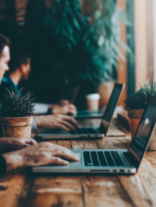 A group of professionals attending an online course or certification in digital tools, emphasizing the need for continuous digital learning