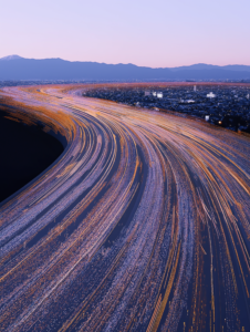 A highway where cars are replaced by data streams, illustrating the flow of information in the digital world