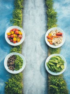 A road leading to a gym with healthy meal plates along the way, symbolizing how proper nutrition is the path to fitness success